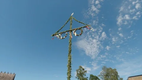 Swedish May or Midsummer pole. Sunny summer day in Sweden. handheld shot Stock Footage 119233612