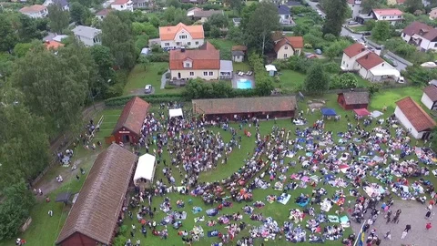 Swedish Midsummer dance around the pole - drone view from above Video stock 90695564