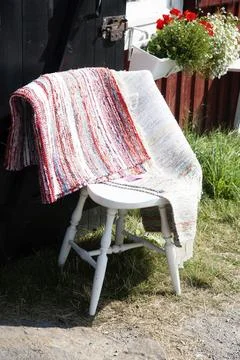 Swedish patchwork carpets outside a small store in Sweden, island Oeland Stock Photos