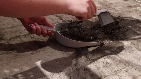 Sweep up the garbage on the balcony or terrace. Stock Footage 277338802