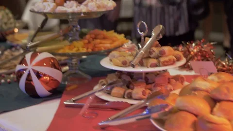 Sweep over fancy table filled with appetizers ready to be eaten Stock Footage 125410823