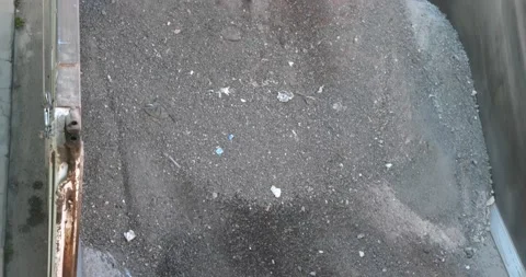 Sweeper attachments mini excavator. The sweeper sweeps, collects and dumps di Vídeo Stock 183800948