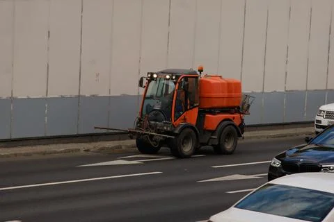 Sweeper clean up car on the road Stock Photos