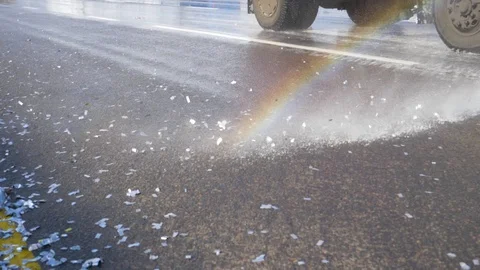 Sweeper Pour Water The Road Under Pressure Cleans The Asphalt From Dirt Stock Footage 99771280