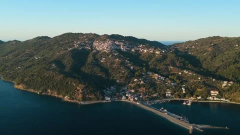 A sweeping aerial panorama of Glossa and Loutraki on Skopelos island, Greece Stock Footage 346708673