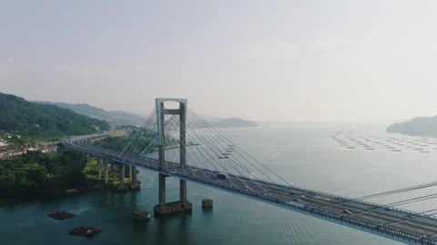 Sweeping aerial perspective of the Rande Bridge near the city of Vigo in Vídeos de archivo 336286851
