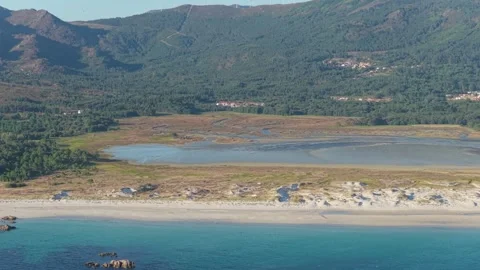 A sweeping aerial shot captures the stunning coastline of Carnota, Spain Stock Footage 346713495