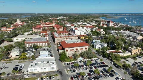 A sweeping aerial view captures the heart of downtown St. Augustine on its Stock Footage 327491883