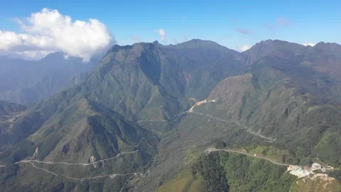 A sweeping aerial view of the lush, rugged mountains surrounding Phan Xi Pang Stock Footage 346664456