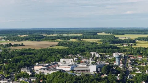 A sweeping aerial view over the town of Gien, France, showing a mix of Stock Footage 346723805