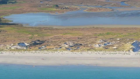 A sweeping aerial view of Praia de Carnota in Carnota, Spain, showcasing the Stock Footage 346707941