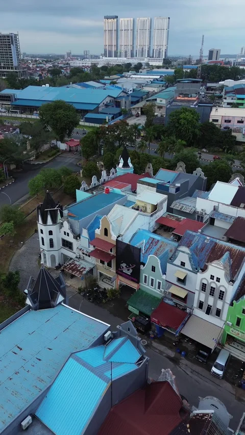 Sweeping Aerial View of a Quaint Yet Modern Residential Enclave Transitioni.. Stock Footage 339040003