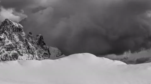 Sweeping, black-and-white timelapse across snowcapped Italian mountains. Stock Footage 68305023
