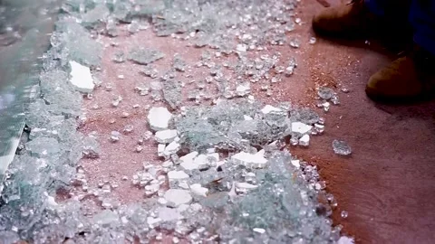 Sweeping up broken glass Stock Footage 158888345
