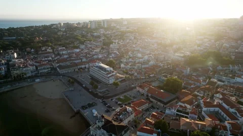 Sweeping cinematic view over Cascais Bay in Lisbon region, Portugal at sunset Stock Footage 245243060