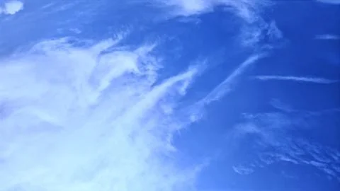 Sweeping Cirrus Cloud Trails Across Deep Blue Sky Photos