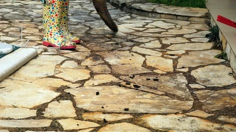 Sweeping up dirt with a broom Stock Footage 87990900