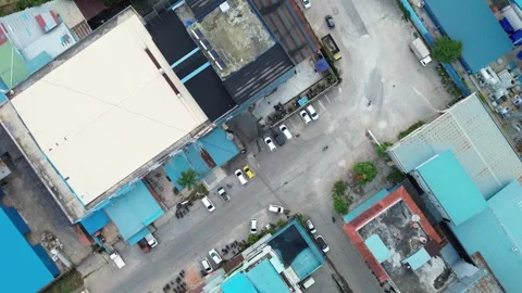 Sweeping Drone Footage Capturing the Intricate Layout of a Developing Manuf.. Video stock 339036237
