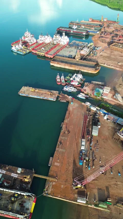 Sweeping drone footage showcases an expansive industrial port, a nexus for .. Stock Footage 337283365