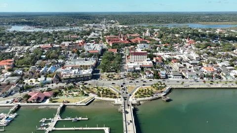 A sweeping drone perspective captures downtown St. Augustine’s historic core Stock Footage 327278495