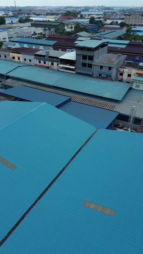 Sweeping drone perspective showcasing a sprawling modern industrial complex.. Stock Footage 339040034