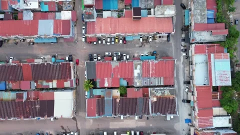 Sweeping drone perspective of a vibrant Southeast Asian urban fabric with c.. Video stock 339037258