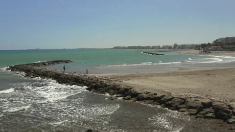 Sweeping Drone shot over beachfront in Spain. Stock-Footage 150403755