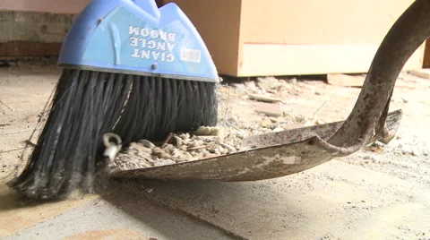 Sweeping Into Dustpan Stock Footage 57713472