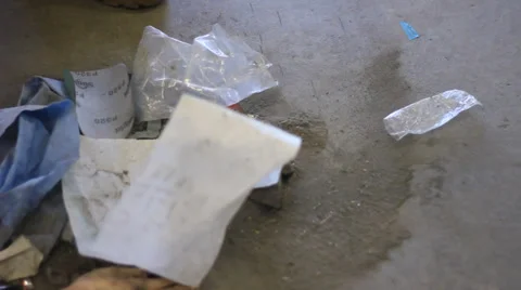 SWEEPING GARBAGE ON CEMENT Video stock 32636917