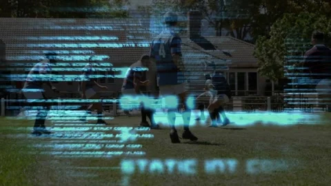 Sweeping glitching code overlay while rugby players sprinting contesting ball Stock Footage 328252219