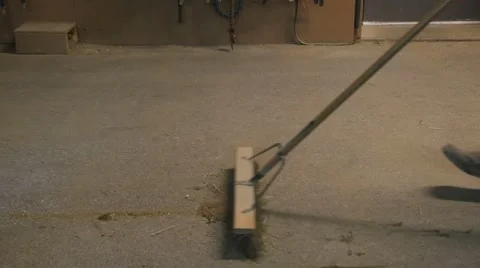 Sweeping out a barn Stock Footage 49322259