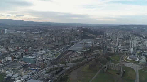 Sweeping panoramic view over Edinburgh above Calton Hill, drone aerial 4K Stock Footage 101218278