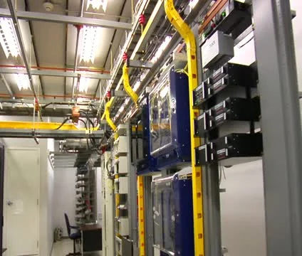 Sweeping past racks of computer servers and equipment Stock Footage 21585726
