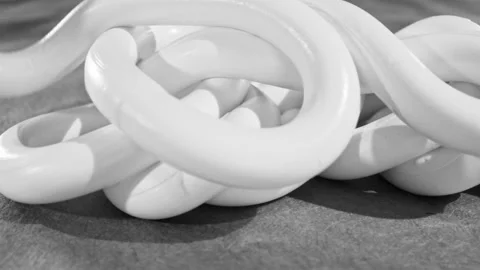 In a sweeping S pattern, material is put across the top. Moving left, Stock Footage 171818362