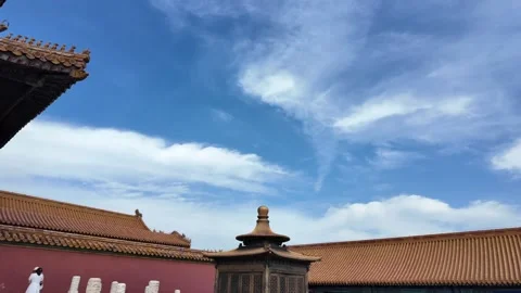 A sweeping view of the Forbidden City from above, showcasing its majestic red Video stock 337307193