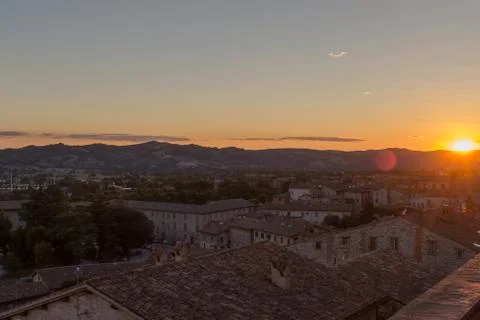 A sweeping view of the rooftops of Gubbio at sunset taken from the main Piazza Stock Photos