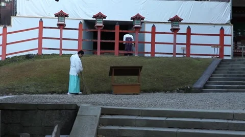 Sweeping of yard in Kasuga  Stock Footage 46179842