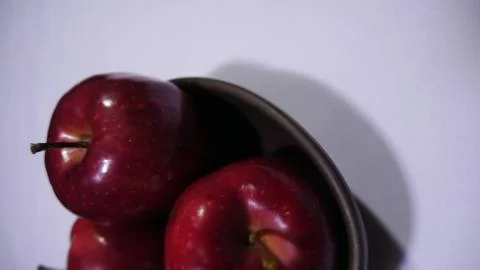 Sweet apple with stem leaf on bowl. Image fruit Stock Photos