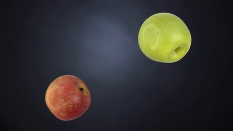 Sweet apples fly and collide. Dark and light background. Mask isolated Stock Footage 114627083