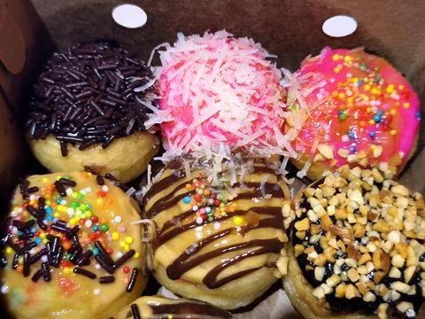 Sweet Assorted Donuts in a Box Stock Photos