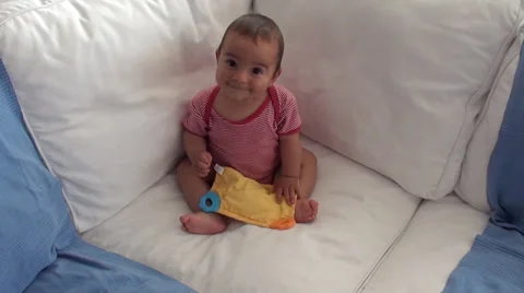 Sweet baby at the corner of settee 2 Stock Footage 39722301