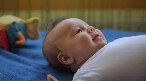 Sweet baby is lying on a back Stock Footage 67266293
