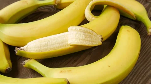 Sweet bananas on the table. Stock Footage 245881223