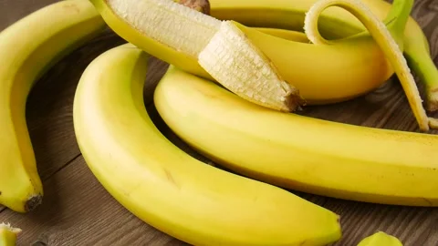 Sweet bananas on the table. Video stock 297364925