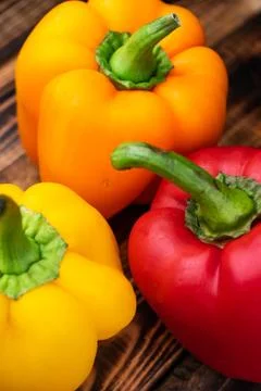 Sweet bell pepper on wooden background Stock Photos