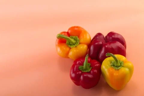 Sweet bellpepper on a colored background. Studio light. Top view Stock Photos