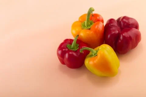 Sweet bellpepper on a colored background. Studio light. Top view Stock Photos