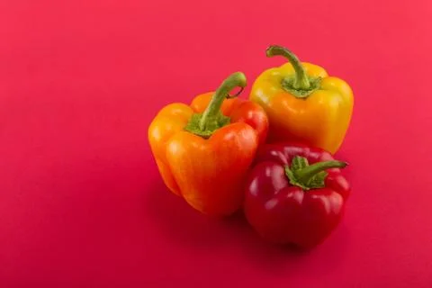 Sweet bellpepper on a colored background. Studio light. Top view Stock Photos