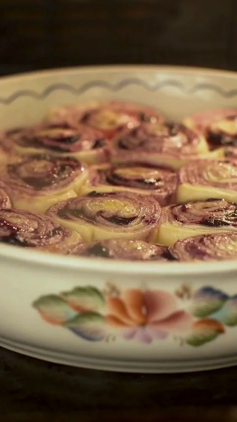 Sweet berry rolls baked in a ceramic dish Stock Footage 334168451