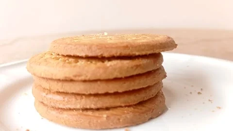 Sweet biscuit on a table and with a white background Stock Footage 146251928